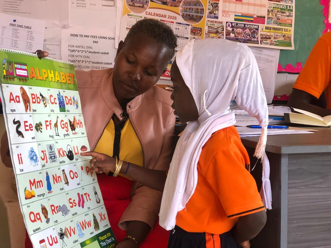Phonics Train consultant conducting a reading assessment