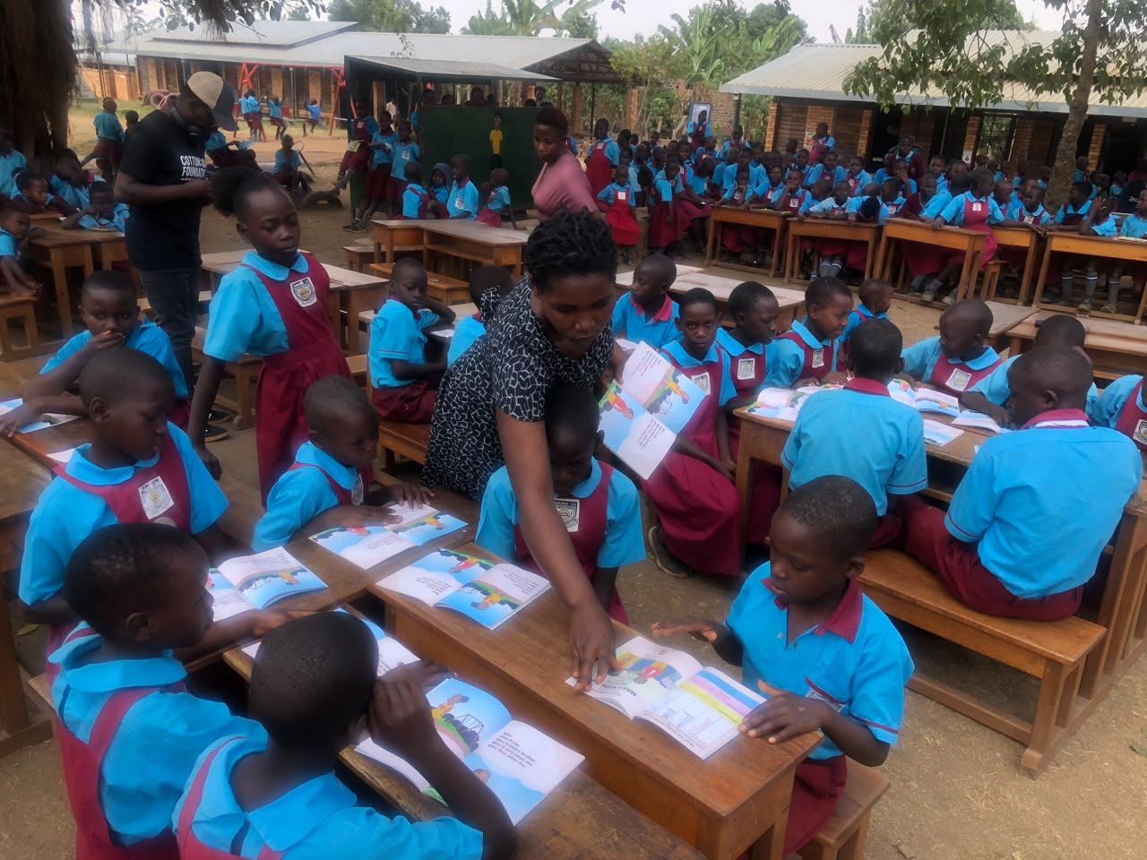 Learners reading Phonics Train books during a school reading session